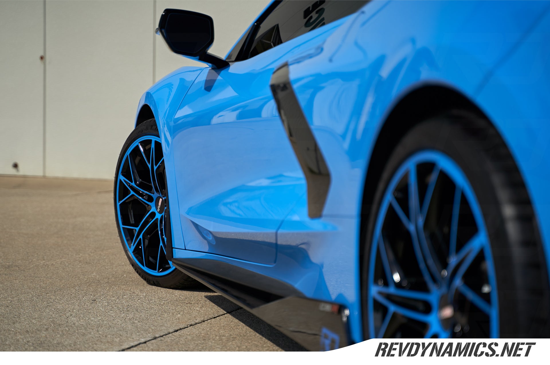 Corvette C8 with Color matched blue and black rims