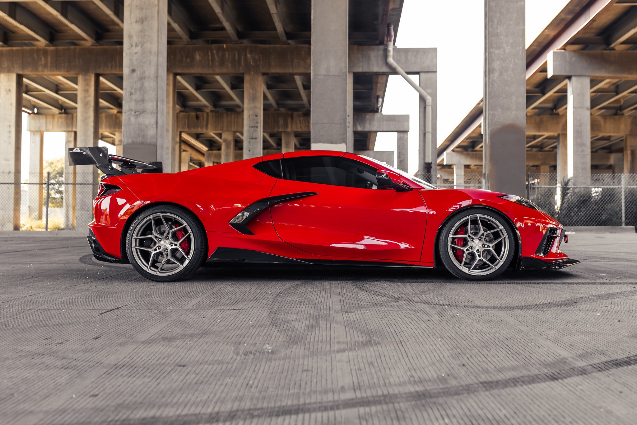 Corvette C8 Torch Red with Rohana RFX11 Brushed Titanium 19 and 20 inch wheels side shot