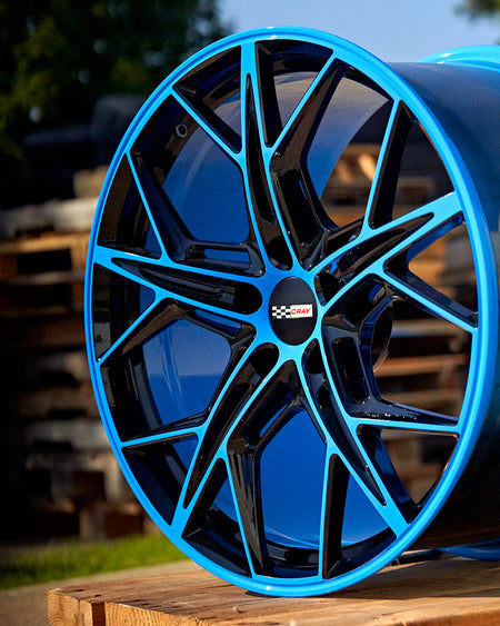 Corvette C8 Rapid blue and black wheel and tire package 20in