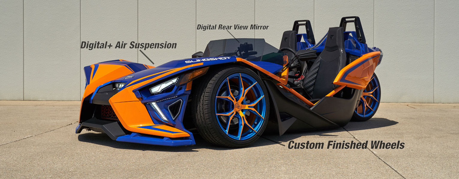 2021-Polaris-Slingshot-with-air-ride-in-stealth-blue-and-sunrise-orange.sitev2