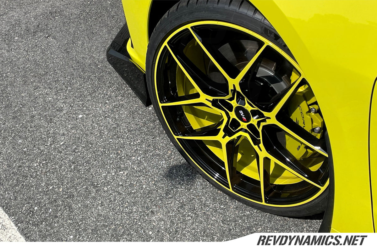 Corvette C8 wheels color matched in accelerate yellow and black