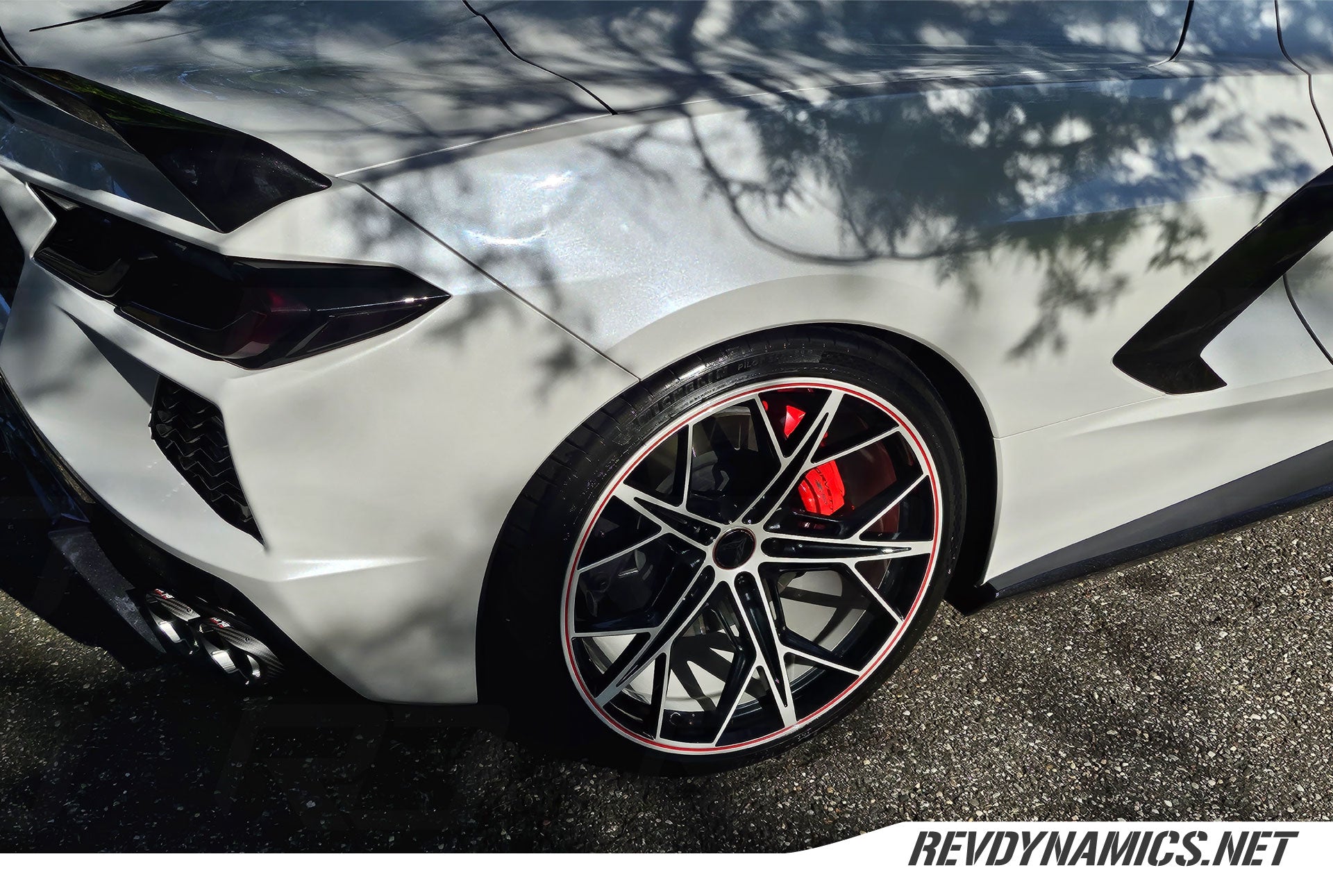 Corvette C8 with color matched rims 20x9 and 21x12