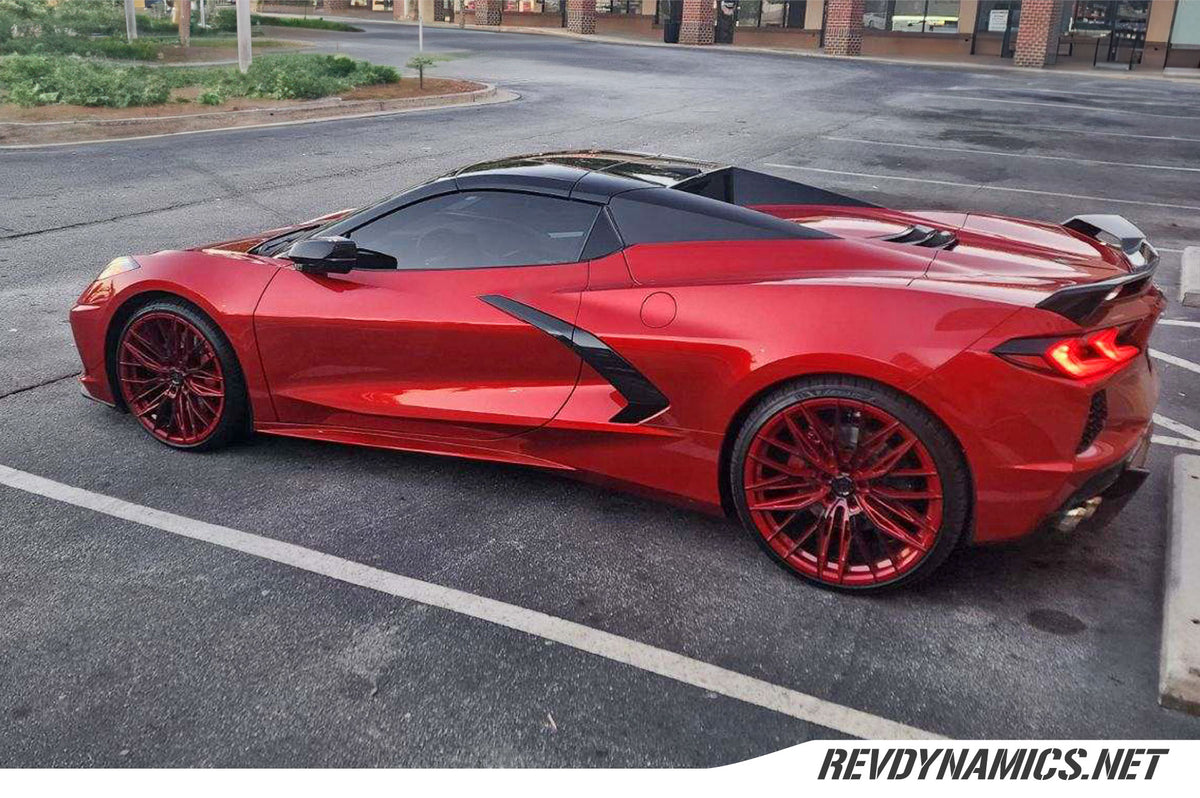 Custom Lexani Aries wheels on a Corvette C8 color matched in Red Mist and Black two tone